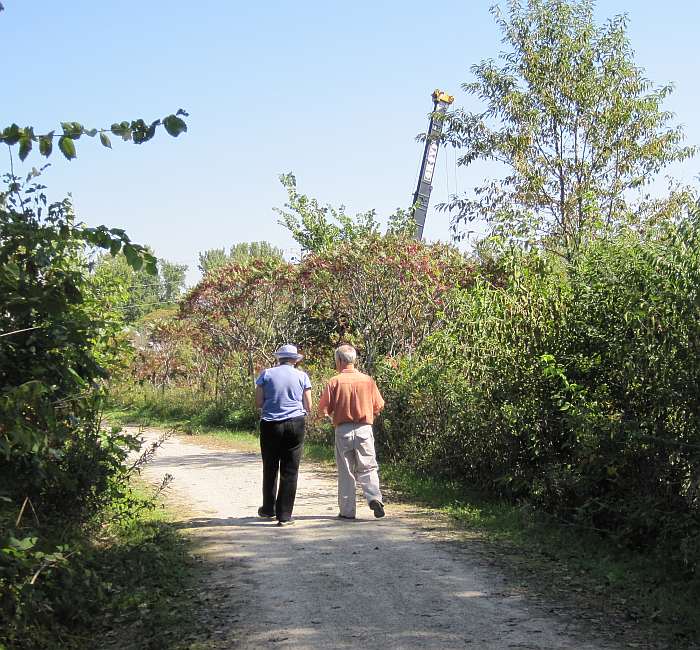 09/16/09.   Judy and Ron walk back up the west trail to the bridge site