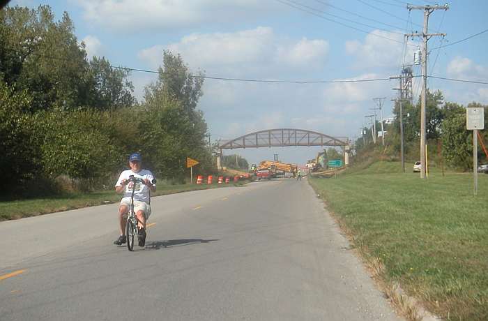 Before the road is opened again, Chris takes a ride on his recumbent.