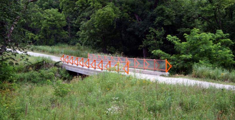 One of Judy Bales art-enhanced bridges on the South Trail