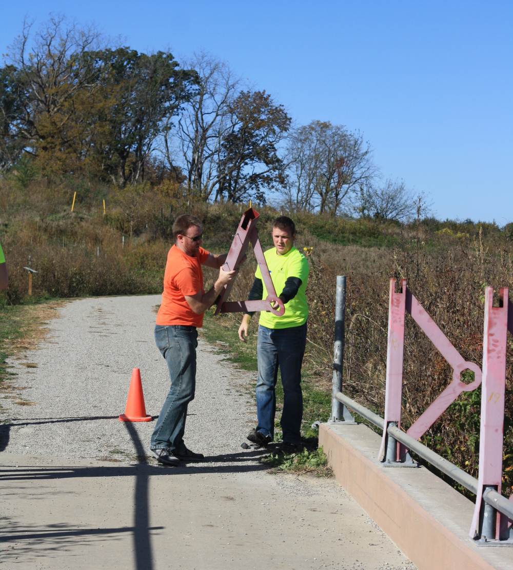 Community  1st Credit Union employees volunteering on the Loop Trail