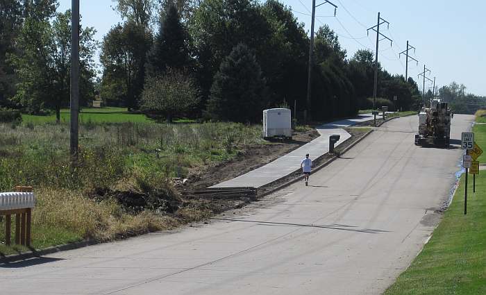 Earlier that day, before the dirt work by the mailboxes was completed.