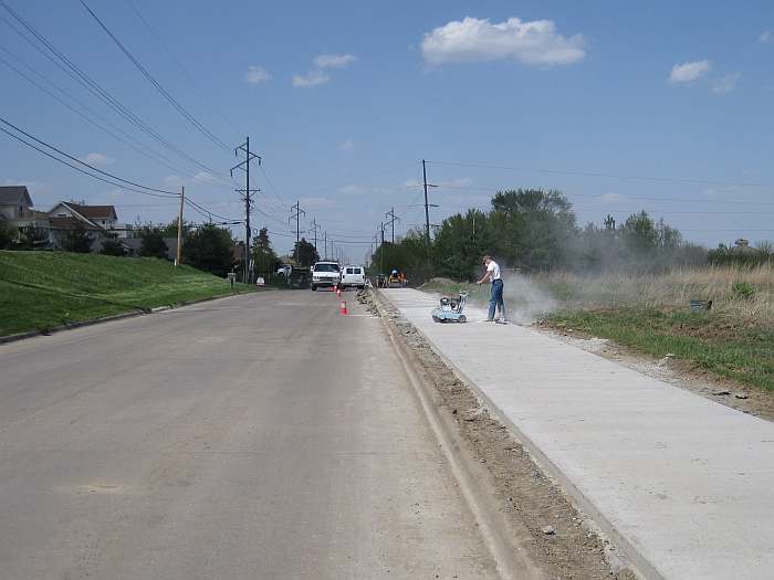 The concrete now has set and the concrete is being scored.