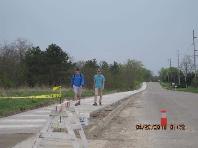 Trying out this newest section of the sidewalk. The final short section up to Zimmerman Blvd will be completed a little later.