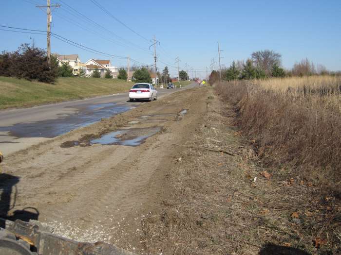 In the Spring of 2010 the paving will be extended up to Zimmerman Blvd.   12/05/09