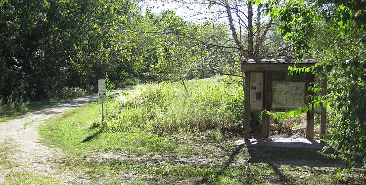 A trailhead kiosk along the trail