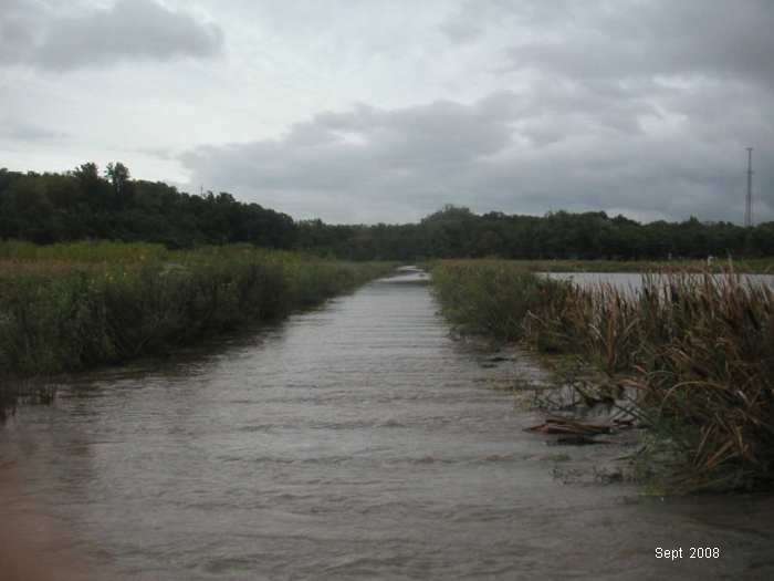 Further east along the trail, which is covered by water.