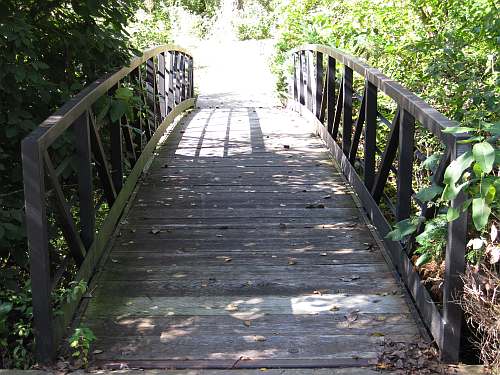 This bridge leads to Hilltop Lane.