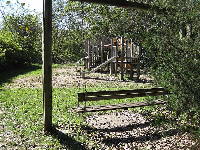 The playground.  A brook is to the right.
