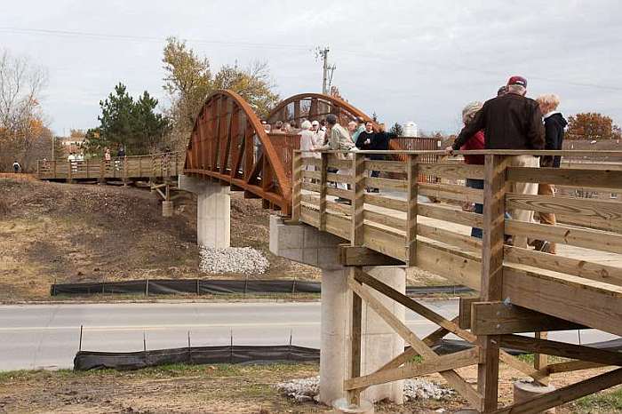 (10-25-09)  The railroad bridge over Hwy 1 was removed after the Rock island Railroad ceased operations in 1980.