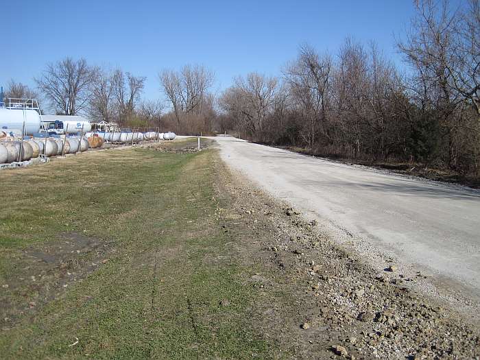 Now we are on the old Rock Island roadbed, which continues straight ahead