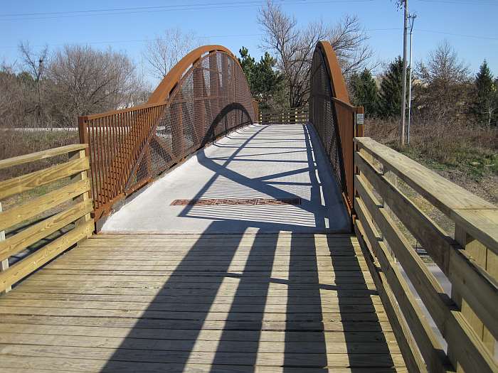 Bridge contractors built and installed the bridge, which is built from maintenance-free steel