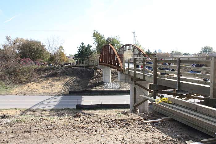 10/18/09.   It's the next Sunday afternoon and railings are being installed.