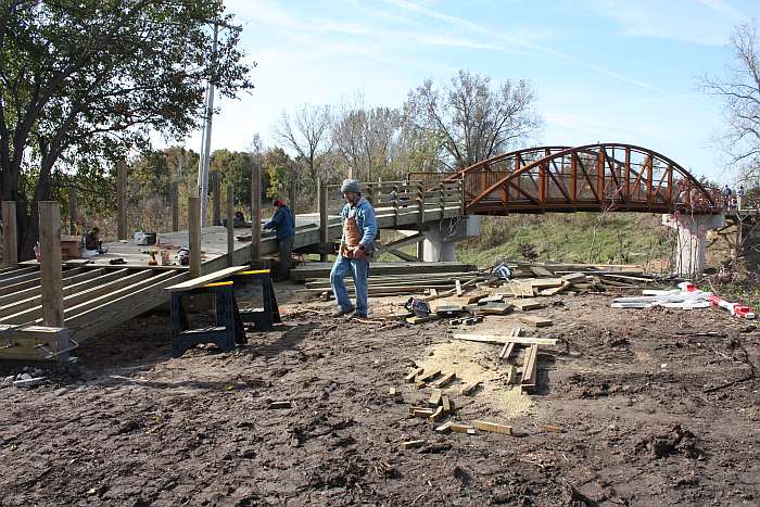 10/18/09.   The joists now have reached the end-footer.