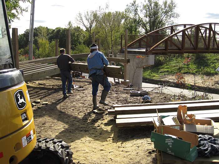 10/04/09.   The joists run from stringer to stringer to hold the deck floor