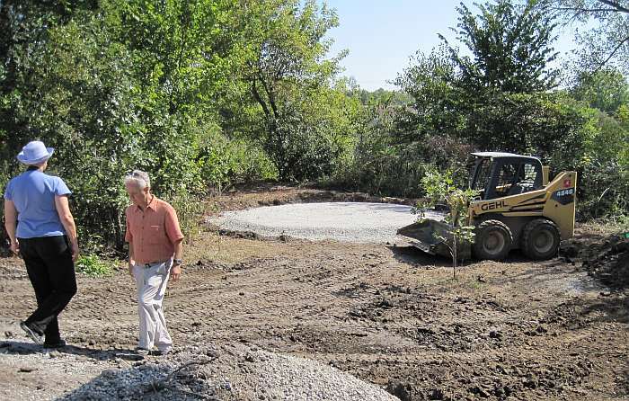 Judy Bales (designer) and Ron Blair inspect the Plaza site