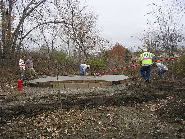 10/27/09.   The wide float brings the water to the surface and smooths it off.