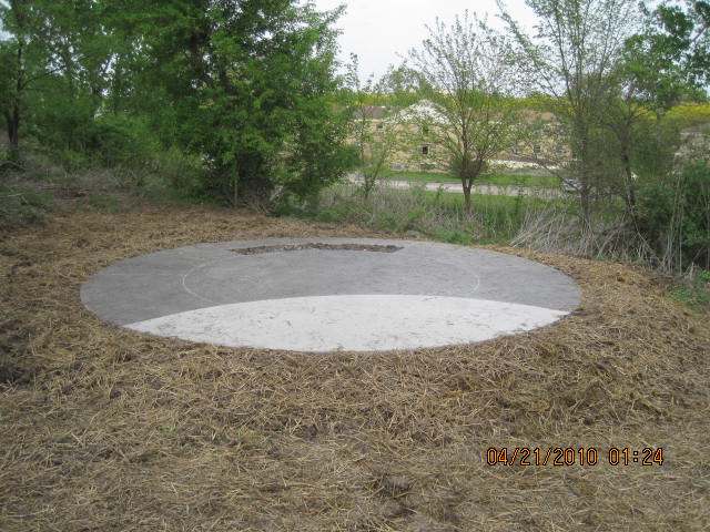 The straw will help keep the moisture in the ground while the seed germinates.