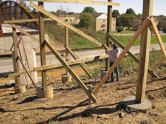 09/30/09.   The braces will be removed when the concrete sets up.   The contractor checks for level