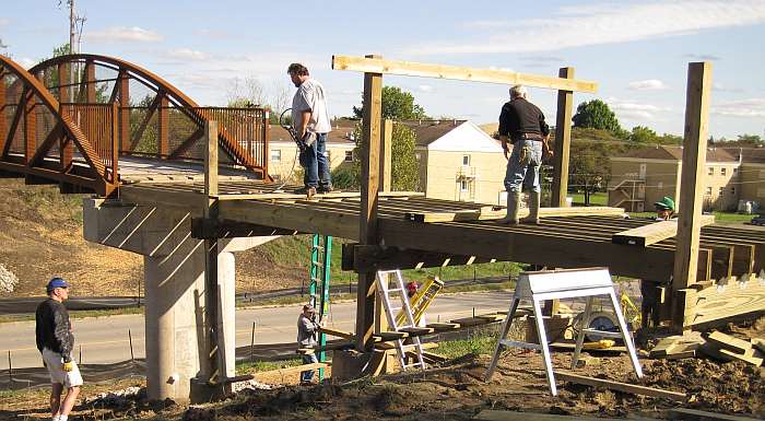 10/04/09.   The next day joists got attached to the stringers.