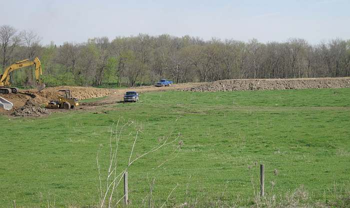 The old railroad bed has to be raised to accommodate the tunnel.