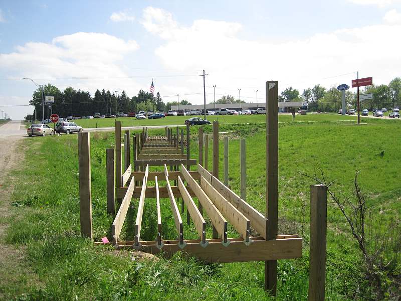 This bridge will allow users to cross Brookville Road to the Loop Trail section that will soon be built behind the Super 8 Motel. In the background is the Fesler Automall.