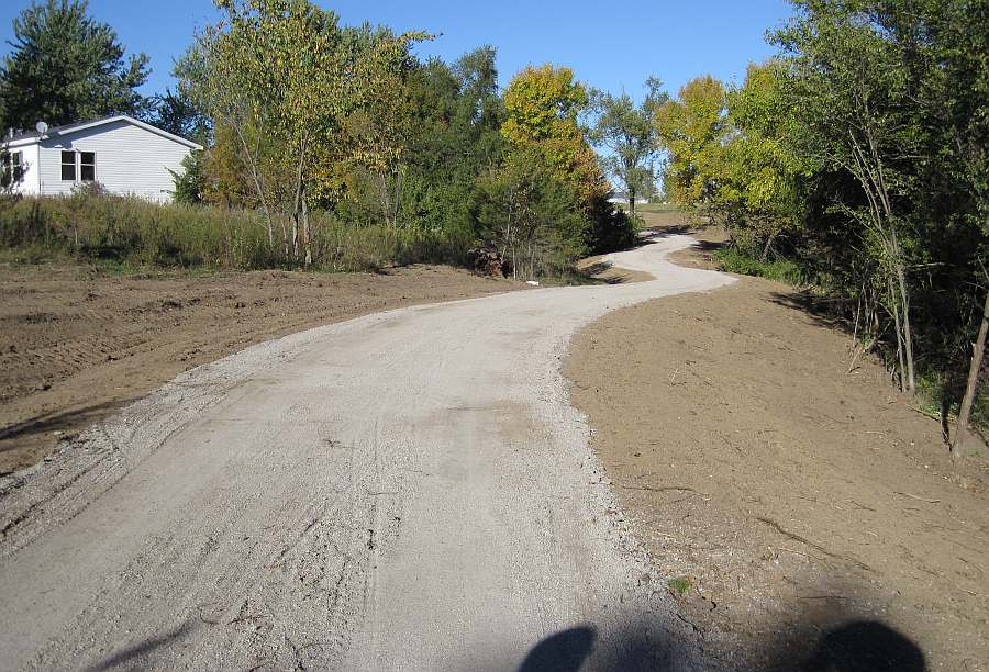 The trail travels behind Super 8, heading towards Briggs Ave.